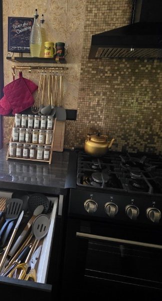 Cabin kitchen cooktop and cookware detail