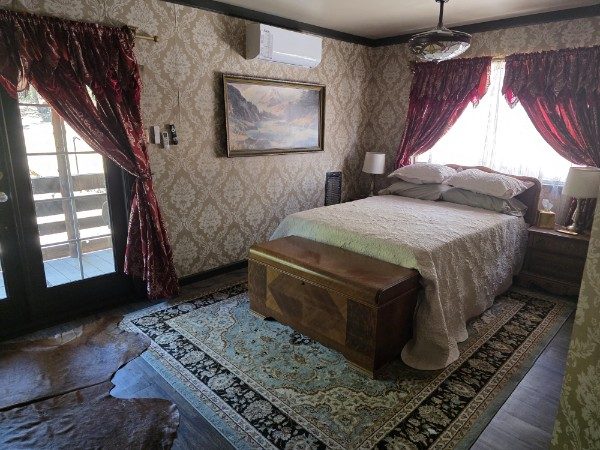 Queen bedroom from the foot of the bed